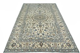 Surface texture of 2000s Kashan rug with natural Wool and intricate pattern