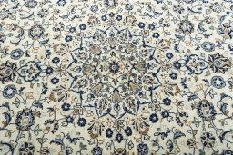 Central medallion detail of 2000s Kashan rug from Iran / Persia