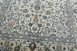 Close-up detail of 2000s Kashan rug from Iran / Persia showing Wool weave