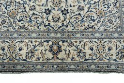 Full view of 2000s Kashan rug from Iran / Persia, 305 × 194 cm in Beige tones