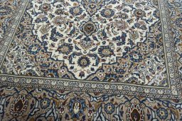 Close-up detail of 2000s Kashan rug from Iran / Persia showing Wool weave