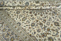 Close-up detail of 2000s Kashan rug from Iran / Persia showing Wool weave