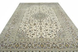 Surface texture of 2000s Kashan rug with natural Wool and intricate pattern