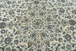 Central medallion detail of 2000s Kashan rug from Iran / Persia
