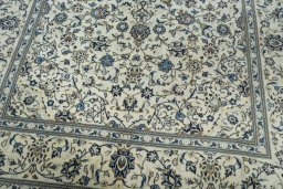 Close-up detail of 2000s Kashan rug from Iran / Persia showing Wool weave