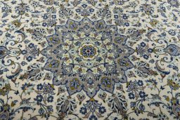 Central medallion detail of 2000s Kashan rug from Iran / Persia