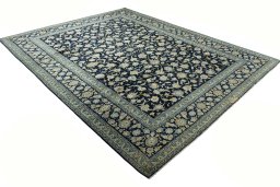 Corner detail of 2000s Kashan rug showing border pattern and Wool pile
