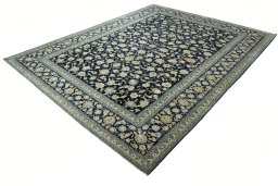 Close-up detail of 2000s Kashan rug from Iran / Persia showing Wool weave
