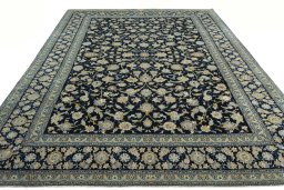 Surface texture of 2000s Kashan rug with natural Wool and intricate pattern