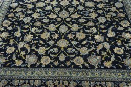 Central medallion detail of 2000s Kashan rug from Iran / Persia