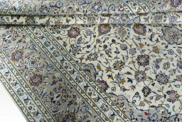 Close-up detail of 2000s Kashan rug from Iran / Persia showing Wool weave