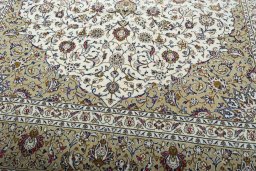 Close-up detail of 2000s Kashan rug from Iran / Persia showing Wool weave