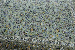 Close-up detail of 2000s Kashan rug from Iran / Persia showing Wool weave
