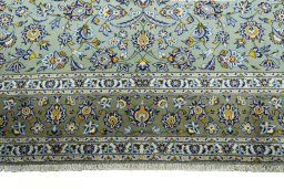 Full view of 2000s Kashan rug from Iran / Persia, 392 × 300 cm in Green tones