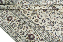 Close-up detail of 2000s Kashan rug from Iran / Persia showing Wool weave