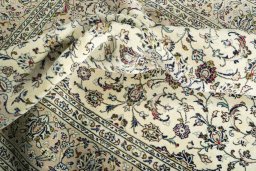Surface texture of New Kashan rug with natural Wool and intricate pattern