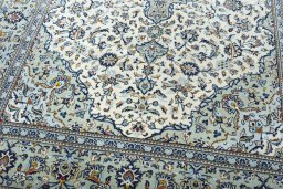 Close-up detail of 2000s Kashan rug from Iran / Persia showing Wool weave