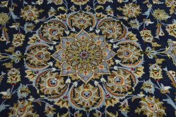 Central medallion detail of 2000s Kashan rug from Iran / Persia