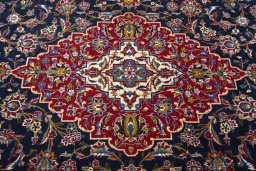 Central medallion detail of 2000s Kashan rug from Iran / Persia