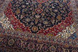 Close-up detail of 2000s Kashan rug from Iran / Persia showing Wool weave