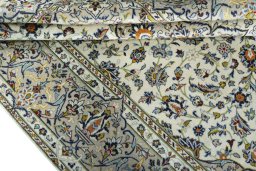Close-up detail of 2000s Kashan rug from Iran / Persia showing Wool weave