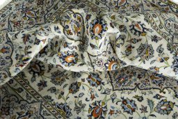 Surface texture of 2000s Kashan rug with natural Wool and intricate pattern