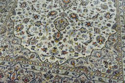 Close-up detail of 2000s Kashan rug from Iran / Persia showing Wool weave