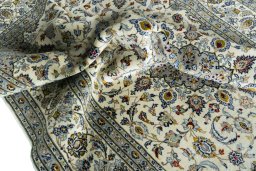 Surface texture of New Kashan rug with natural Cork and intricate pattern