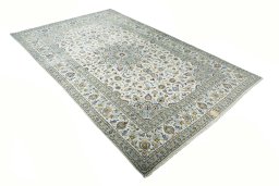 Corner detail of New Kashan rug showing border pattern and Cork pile