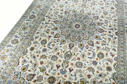 Backside of handmade New Kashan rug showing knot structure and weave density