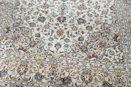 Close-up detail of 2000s Kashan rug from Iran / Persia showing Wool weave