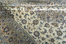 Close-up detail of 2000s Kashan rug from Iran / Persia showing Wool weave