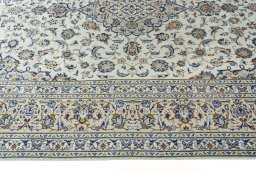 Full view of 2000s Kashan rug from Iran / Persia, 367 × 245 cm in Beige tones