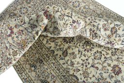 Surface texture of 2000s Kashan rug with natural Wool and intricate pattern