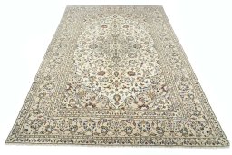 Surface texture of 2000s Kashan rug with natural Wool and intricate pattern