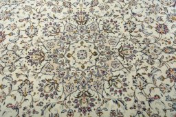 Central medallion detail of 2000s Kashan rug from Iran / Persia