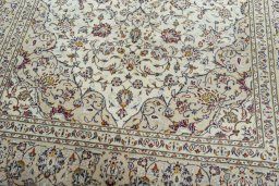 Close-up detail of 2000s Kashan rug from Iran / Persia showing Wool weave