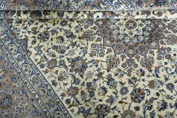Close-up detail of New Kashan rug from Iran / Persia showing Wool weave
