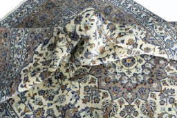 Surface texture of New Kashan rug with natural Wool and intricate pattern