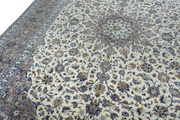 Backside of handmade New Kashan rug showing knot structure and weave density