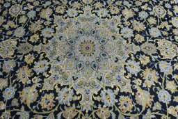 Central medallion detail of 2000s Kashan rug from Iran / Persia