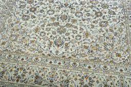 Close-up detail of 2000s Kashan rug from Iran / Persia showing Wool weave