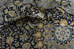 Surface texture of 2000s Kashan rug with natural Wool and intricate pattern