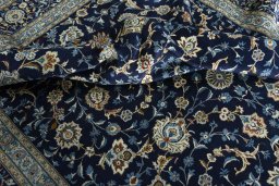 Surface texture of 2000s Kashan rug with natural Wool and intricate pattern