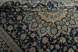 Close-up detail of 2000s Kashan rug from Iran / Persia showing Wool weave