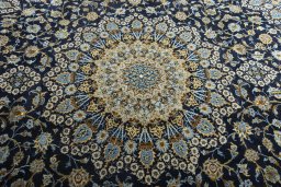 Central medallion detail of 2000s Kashan rug from Iran / Persia