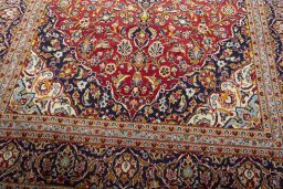 Close-up detail of 2000s Kashan rug from Iran / Persia showing Wool weave