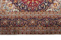 Full view of 2000s Kashan rug from Iran / Persia, 355 × 243 cm in Red tones