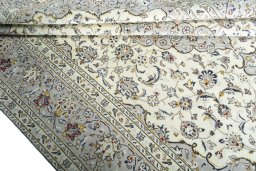 Close-up detail of 2000s Kashan rug from Iran / Persia showing Wool weave