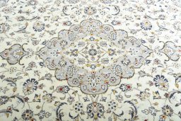 Central medallion detail of 2000s Kashan rug from Iran / Persia